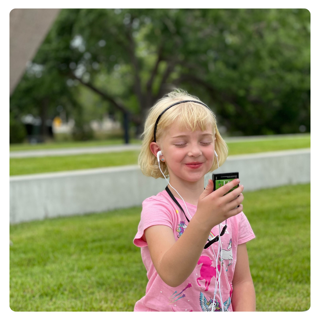 kid listening to podcast