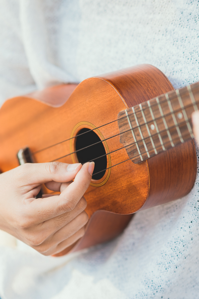 Someone playing ukulele